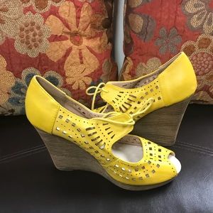 Yellow wedge heel heels by Restricted.